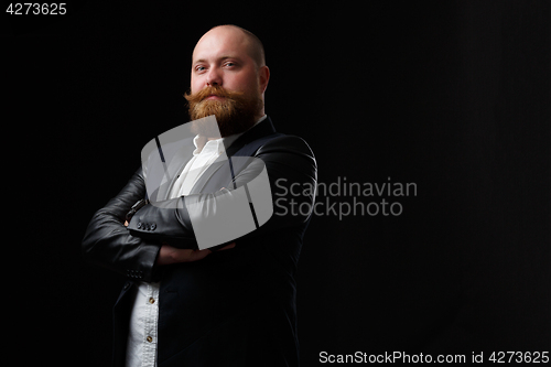 Image of Stout man with arms crossed