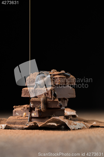 Image of Pyramid of chocolate sprinkled syrup