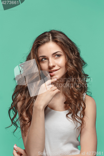 Image of The young woman\'s portrait with happy emotions