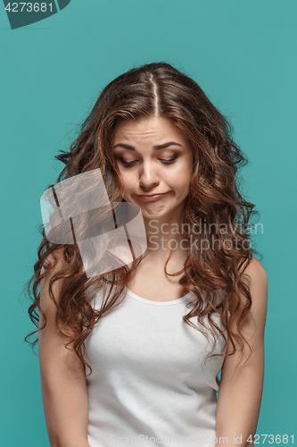 Image of The young woman\'s portrait with thoughtful emotions