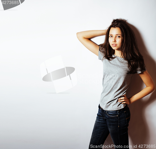 Image of young pretty stylish hipster girl posing emotional isolated on white background happy smiling cool smile, lifestyle people concept