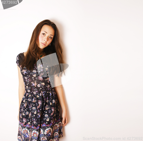 Image of young pretty stylish hipster girl posing emotional isolated on w