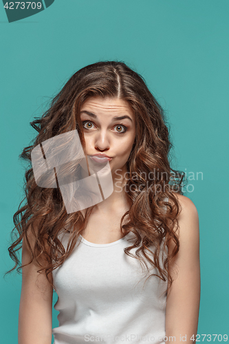 Image of The young woman\'s portrait with thoughtful emotions