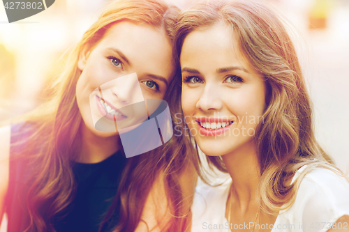 Image of happy young women or teenage girls