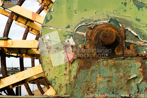 Image of Rusted Paddle Wheel Retired Riverboat