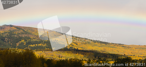 Image of Rainbow Over Fall Color Montana Landscape