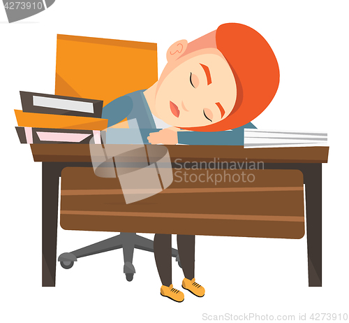 Image of Female student sleeping at the desk with book.