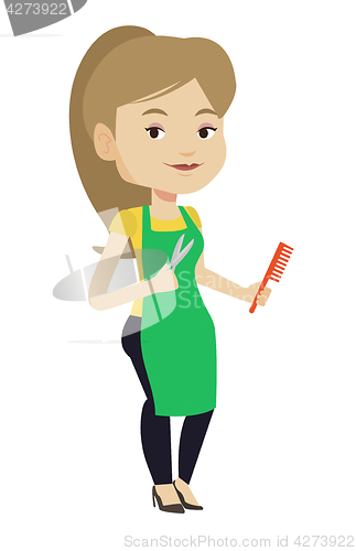 Image of Hairstylist holding comb and scissors in hands.