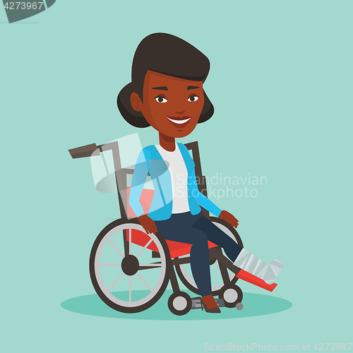 Image of Woman with broken leg sitting in wheelchair.