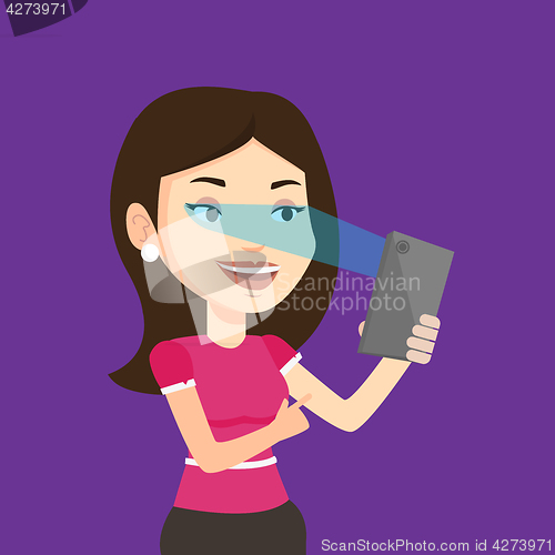 Image of Woman using iris scanner to unlock mobile phone.