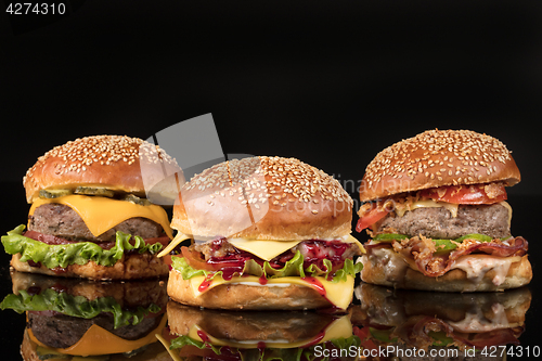 Image of Burgers On Black Glass