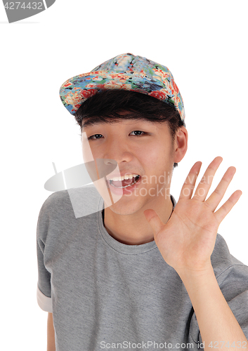 Image of Happy Asian man with cap.