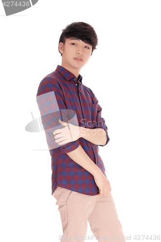Image of Handsome Asian man in checkered shirt.