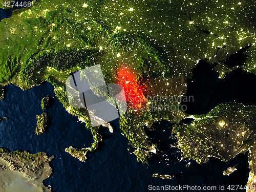 Image of Serbia in red from space at night