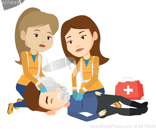 Image of Paramedics doing cardiopulmonary resuscitation.