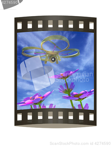 Image of Drone, quadrocopter, with photo camera against the sky and Beaut