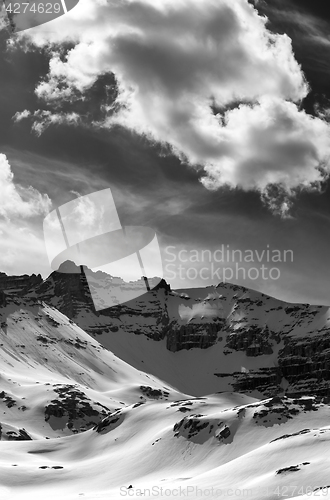 Image of Black and white view on snow mountains in evening