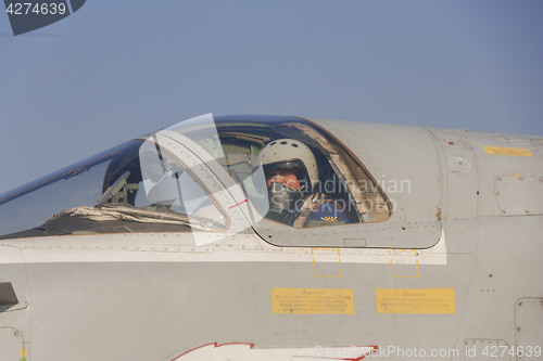 Image of Military pilot in the cockpit of a jet aircraft