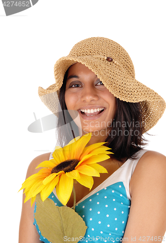 Image of Happy smiling woman with sunflower.