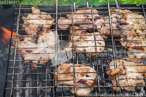 Image of Chicken grilled on a coals