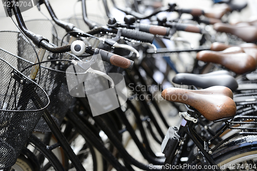 Image of row of bicycles on the street 