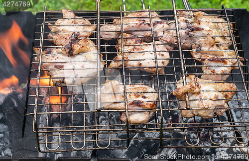 Image of Chicken grilled on a coals