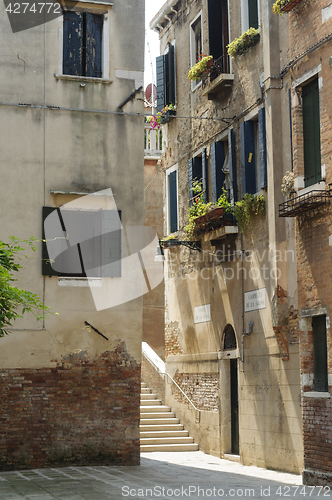 Image of Narrow alley in the historic center of Venice, Veneto, Italy, Eu