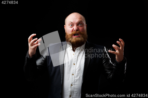 Image of Angry adult man with tense hands