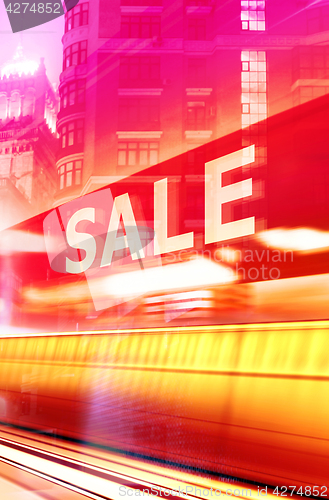 Image of Shop Window With Sale Sign