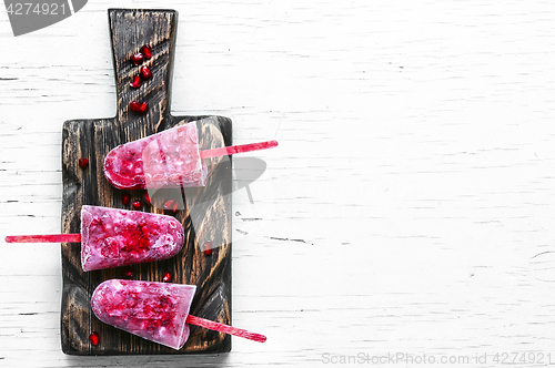 Image of ice cream with berries pomegranate