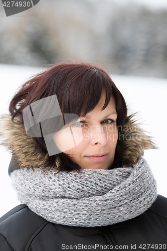 Image of woman without makeup in winter time