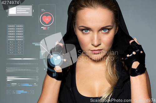 Image of close up of woman in black sportswear