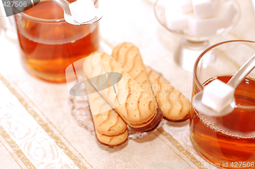 Image of table set for high tea with sweet cookies