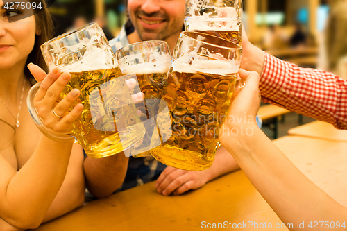 Image of Couples having fun at the Oktoberfest