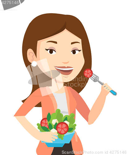 Image of Woman eating healthy vegetable salad.