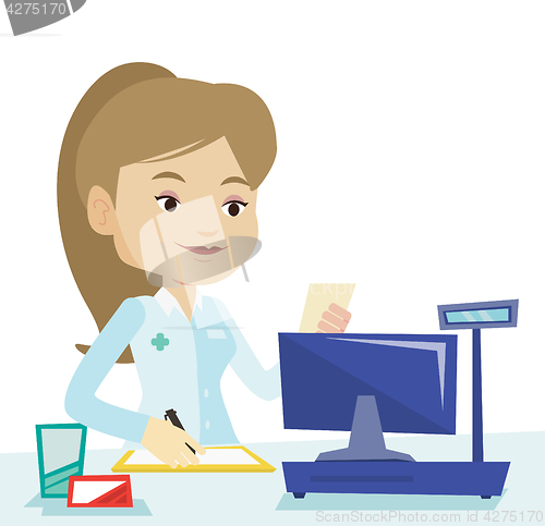 Image of Pharmacist writing prescription.