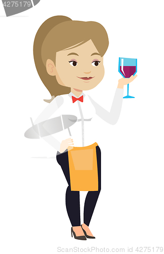 Image of Bartender holding a glass of wine in hand.