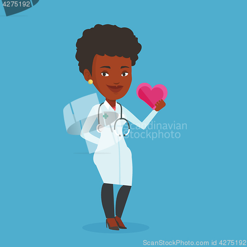 Image of Doctor cardiologist holding heart.