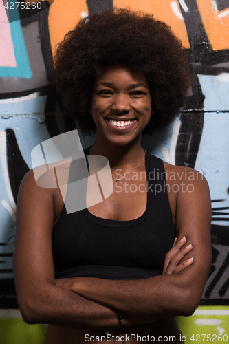 Image of black woman after a workout at the gym