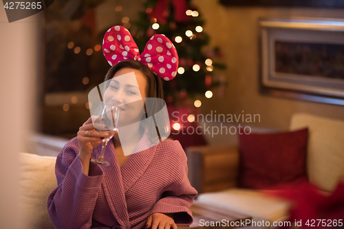 Image of woman drinking champagne at spa