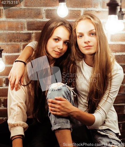 Image of best friends teenage girls together having fun, posing emotional on white background, besties happy smiling, lifestyle people concept 