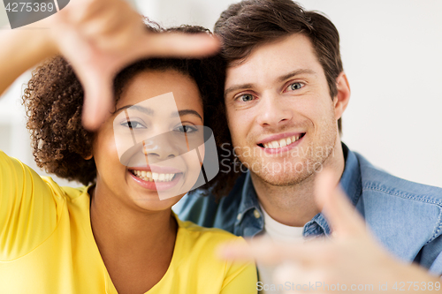 Image of portrait of happy multiethnic couple