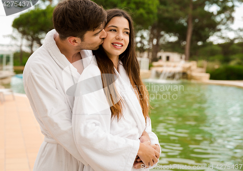 Image of Young couple enjoying vacations