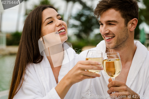 Image of Young couple tasting wine