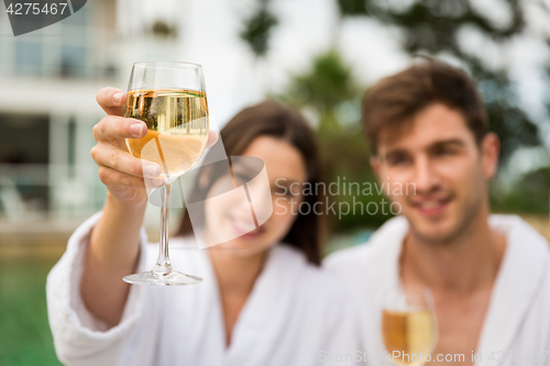 Image of Young couple tasting wine