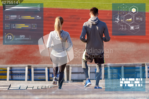 Image of couple walking downstairs on stadium