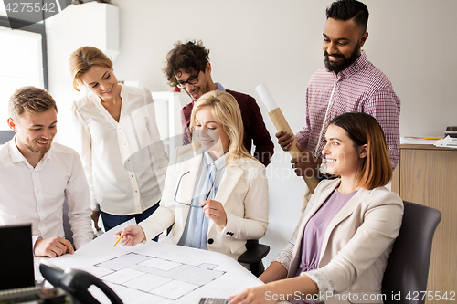 Image of business team discussing house project at office