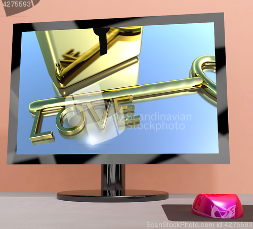 Image of Love Key On Computer Screen Showing Online Dating