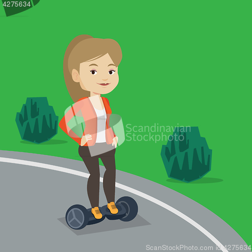 Image of Woman riding on self-balancing electric scooter.