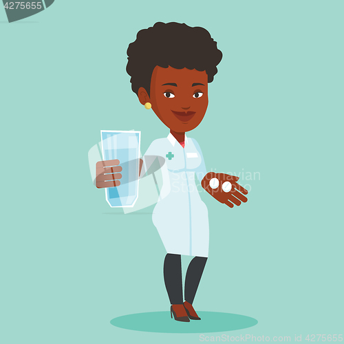 Image of Pharmacist giving pills and glass of water.